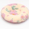 Donutkissen Blumen Creme